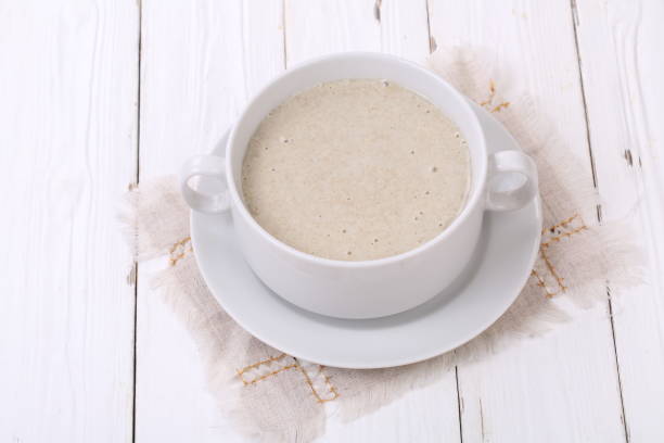istock Rye porridge on a white wooden background 1027765108