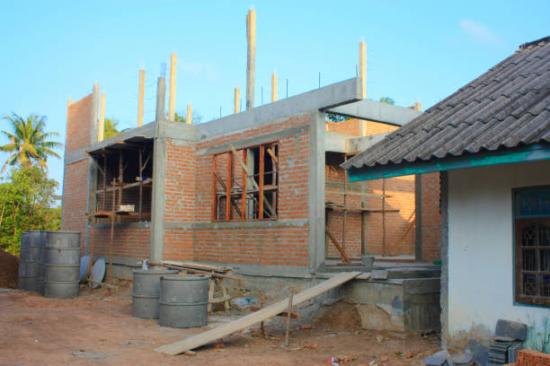 istock A new house brick and mortar structure building and construction. 1027767982
