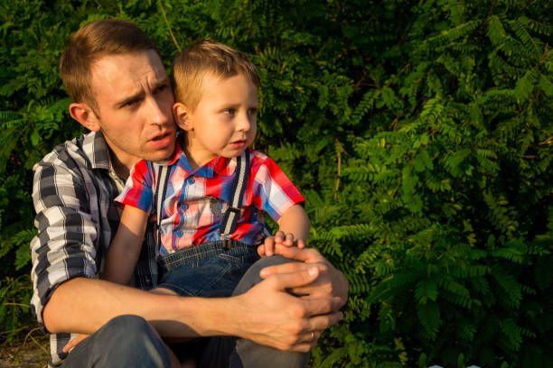istock Dad calms a his little son who is scared and is going to cry 1027768492