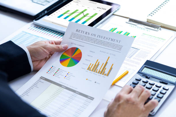 istock Reviewing a financial report in returning on investment analysis 1027771658
