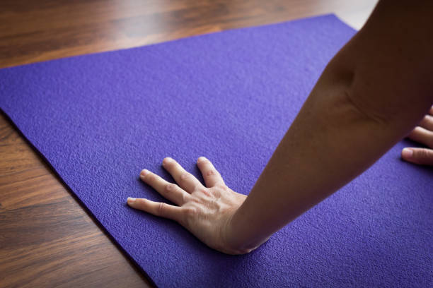 istock Female yogi practices adho mukha svanasana pose 1027771662