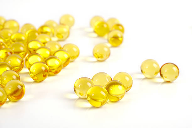 istock gel capsule vitamins and minerals over white 102777185