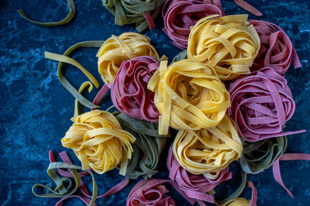 istock Italian Dried tri color noodles 1027772106