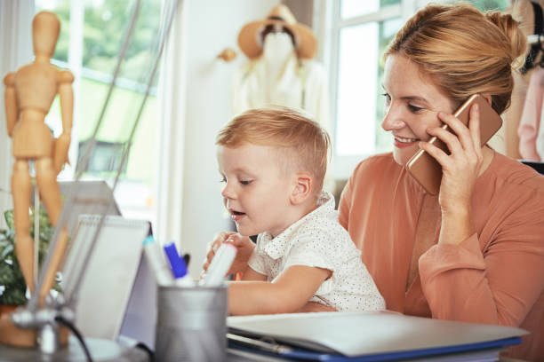 istock Business lady and her son 1027781436