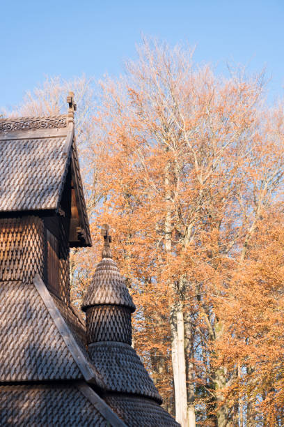 istock Fantoft Stave Church and autumn leaves in fall 1027789672