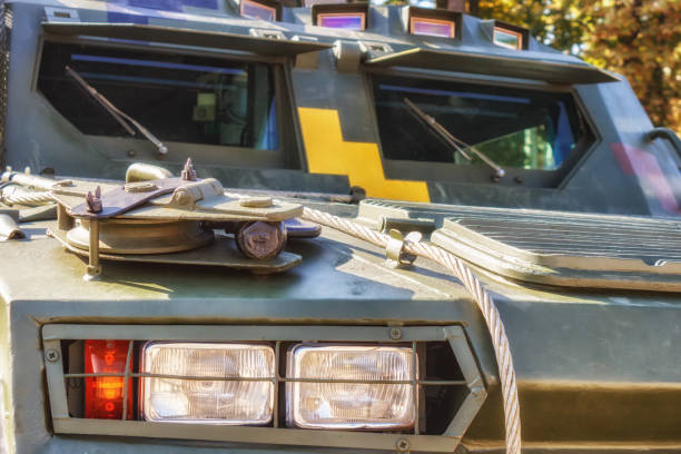 Three armored cars parked side by side