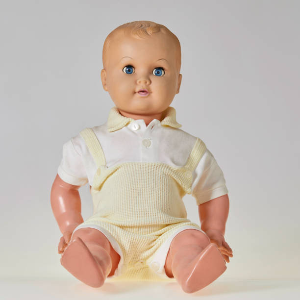 istock Vintage boy doll on white background, front view 1027801174
