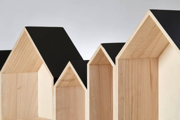istock Row of empty wooden houses on white background, architectural model 1027804338