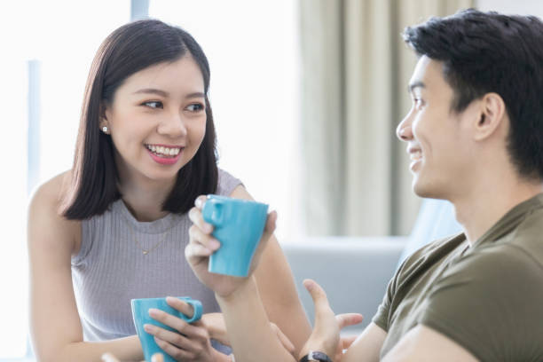 istock Young couple relaxing at home 1027807450