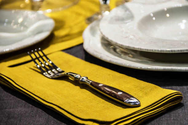 istock The fork is on the napkin next to the plate 1027810532