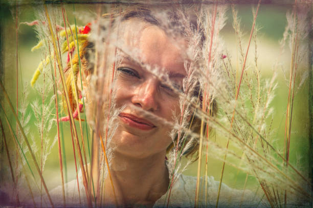 istock women in the feather grass 1027811748