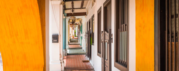 istock Singapore traditional shophouses five foot way covered passage panorama 1027818944