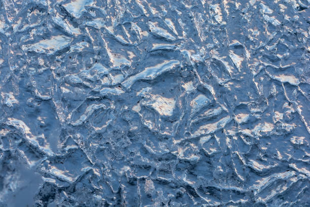 istock texture of the ice surface with bubbles.  winter background. 1027819692