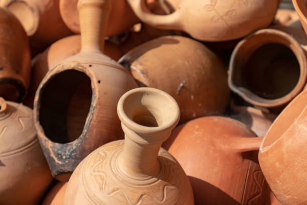istock Many ceramic handmade utensils, made of clay, close up. 1027820208