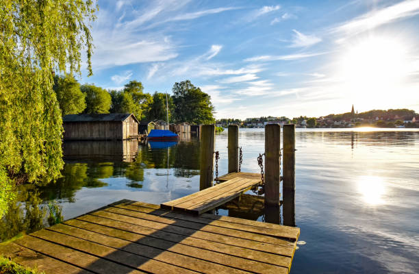 Sunset on the lake with jetty in Malchow (Mecklenburg-Vorpommern / Germany)