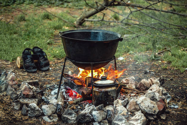 istock a cauldron for cooking is on the fire 1027826630
