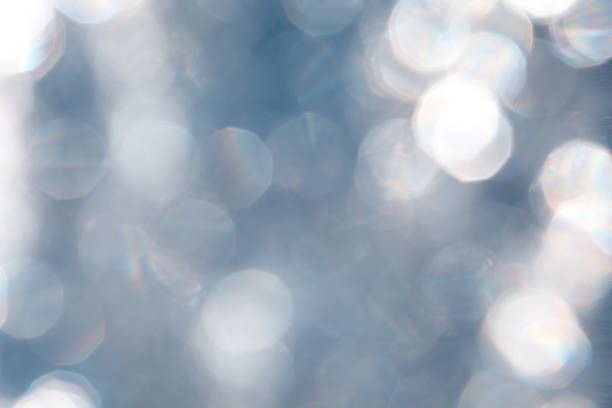 istock bokeh circles for Christmas background, light and blurred boke 1027844694
