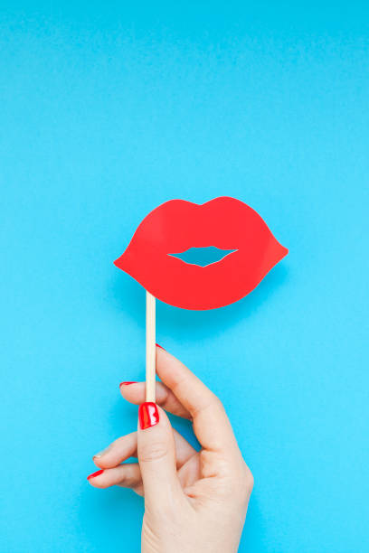 istock Red paper photo booth props female lips 1027851680
