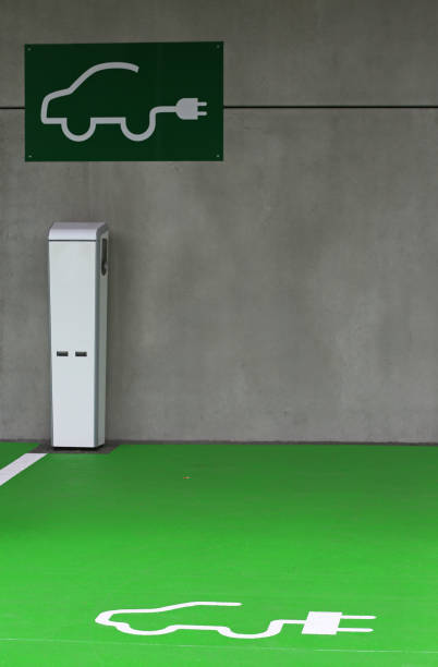 e-car parking e-car parking with charging column in switzerland graubunden canton stock pictures, royalty-free photos & images