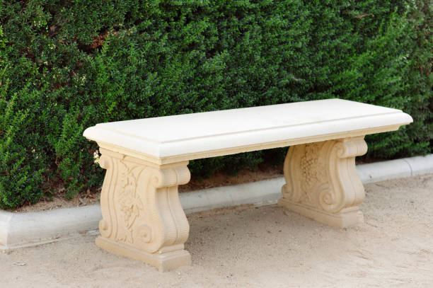 istock View of Stone Bench with Green Bushes 1027858458
