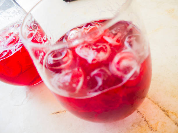 istock vibrant pink raspberry beer on the rocks ice 1027864852