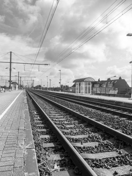 istock Train platform station railroad tracks derelict abandoned 1027864894