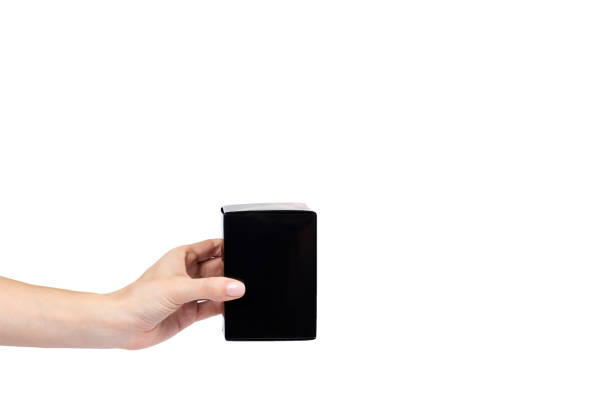 istock Black gift box with hand isolated on white background, copy space template 1027867452