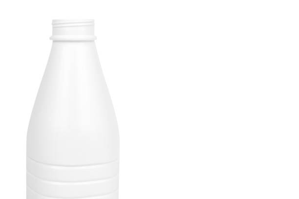 istock White plastic milk bottle isolated on white background, copy space template 1027868250