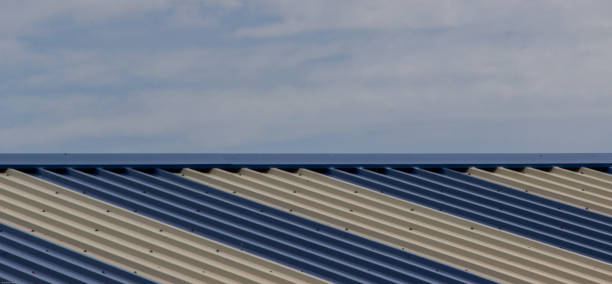 istock Blue white roof and sky 1027875644