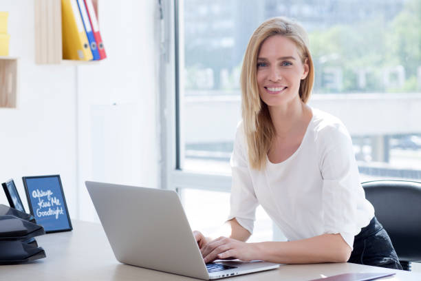 istock Beautiful young business woman 1027885450
