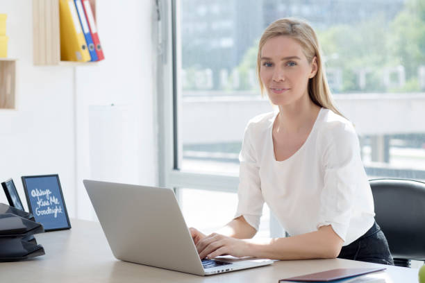 istock Beautiful young business woman 1027885564