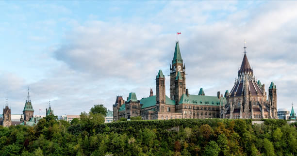 Parliament Hill in Ottawa - Ontario, Canada Parliament Hill - Ottawa, Ontario, Canada. Its Gothic revival suite of buildings is the home of the Parliament of Canada. parliament building stock pictures, royalty-free photos & images