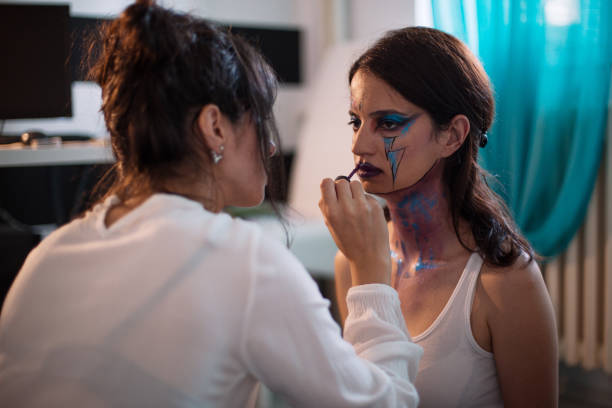 istock Artist painting on a human model 1027889188