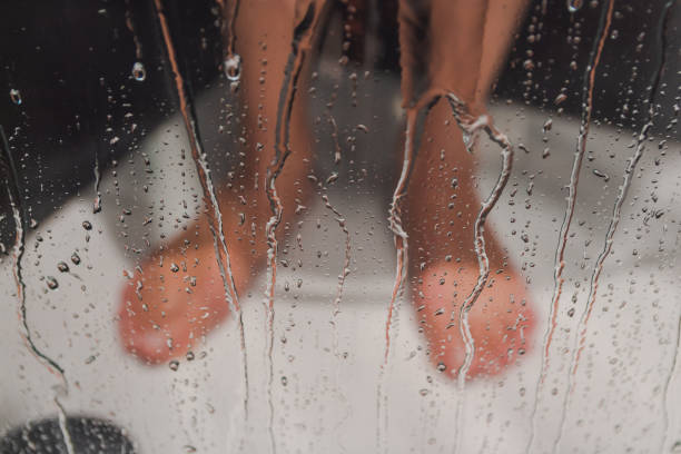 male feet in the shower male taking a shower, picture of feets low quality of life stock pictures, royalty-free photos & images