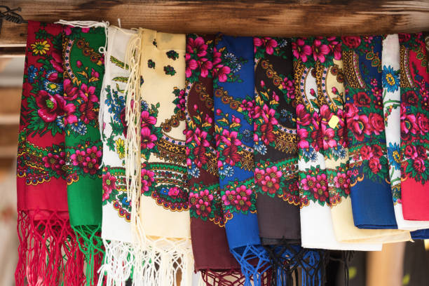 istock Scarves hanging at a market 1027892760