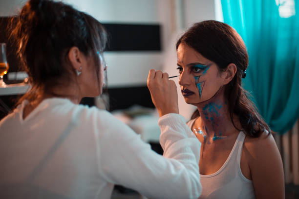istock Artist painting on a human model 1027895388