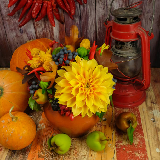 istock Autumn still-life with flowers and fruits 1027896208