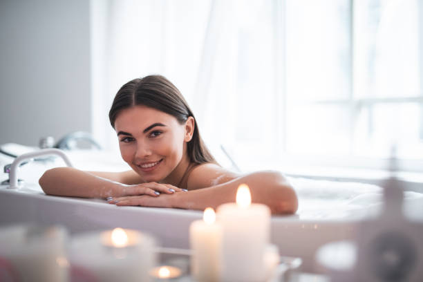 istock Cheerful girl resting in cozy bath indoor 1027900772