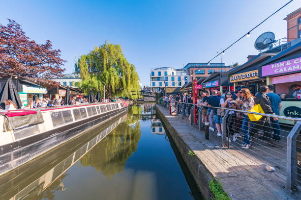 View of the Kerb food market and Camden canal where people come to eat street food on May 05, 2018 in London