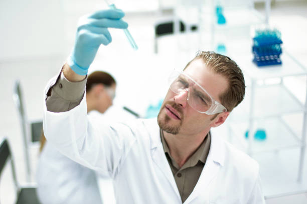 istock serious scientist looks at the test results 1027906562
