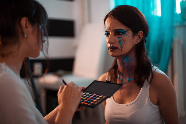 istock Artist painting on a human model 1027906582