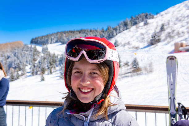 istock Little girl at ski school 1027909320