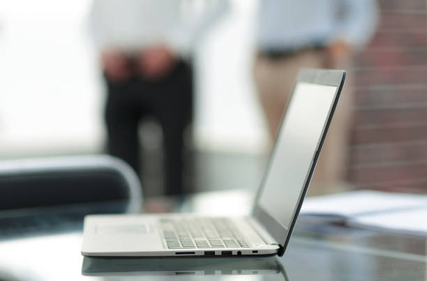 istock business background.laptop on the office Desk 1027916450