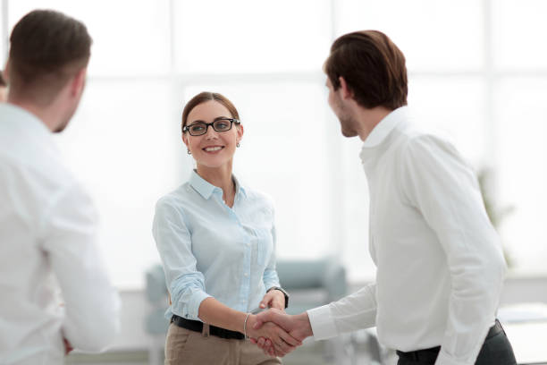 istock business partners reaching out for a handshake 1027916588