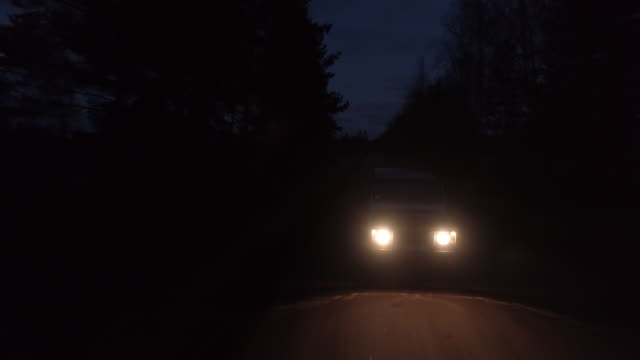 Aerial drone shot of 4x4 driving in night