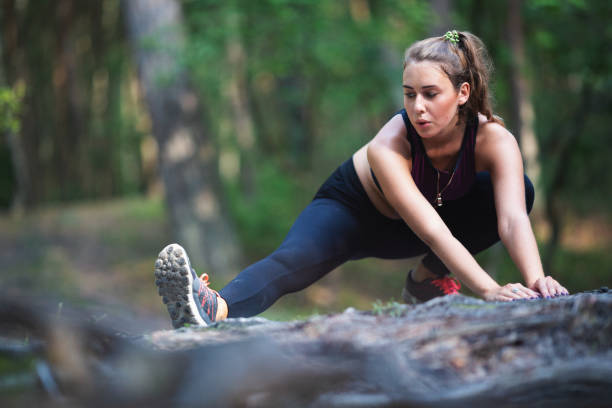 istock Young woman exercising outdoors 1027932652