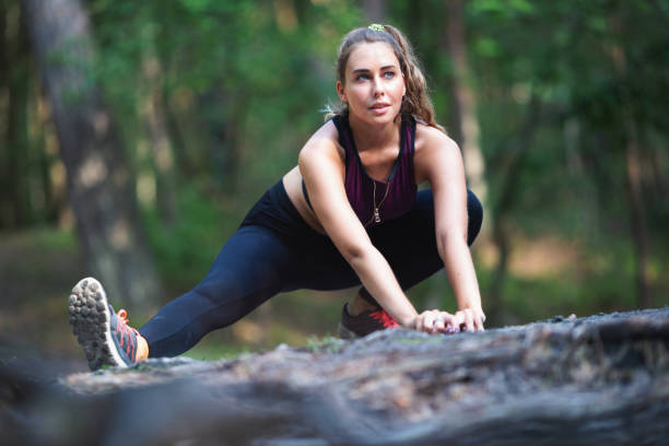 istock Young woman exercising outdoors 1027932728