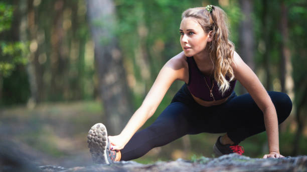 istock Young woman exercising outdoors 1027932810