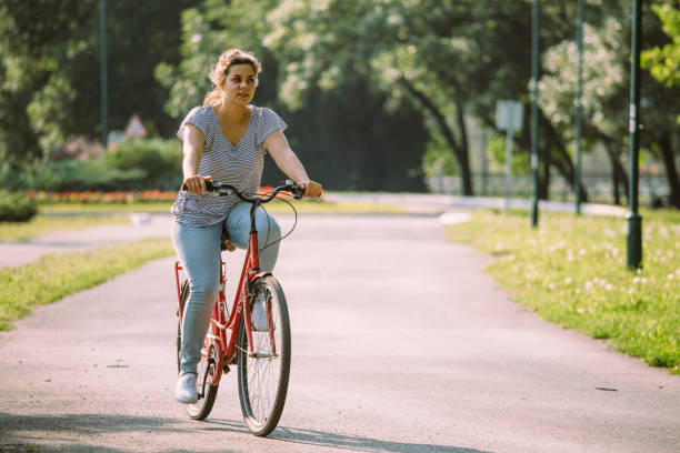 istock Woman on bike trip during summer 1027932936