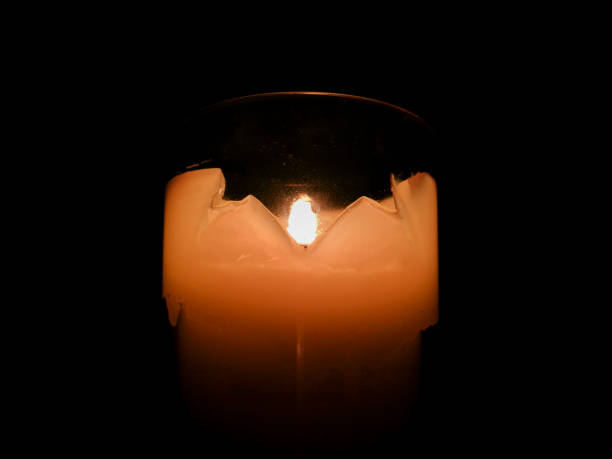 istock Candle Burning in a Glass Holder 1027965994